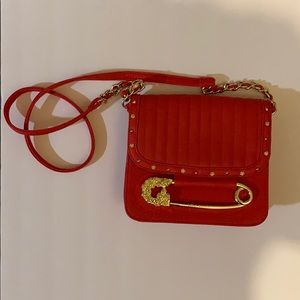 Red Cross body purse never been worn